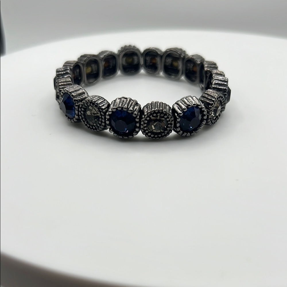 1328.‎ Cara New York Blue & Gray Crystal Stretch Bracelet. Gunmetal underneath.